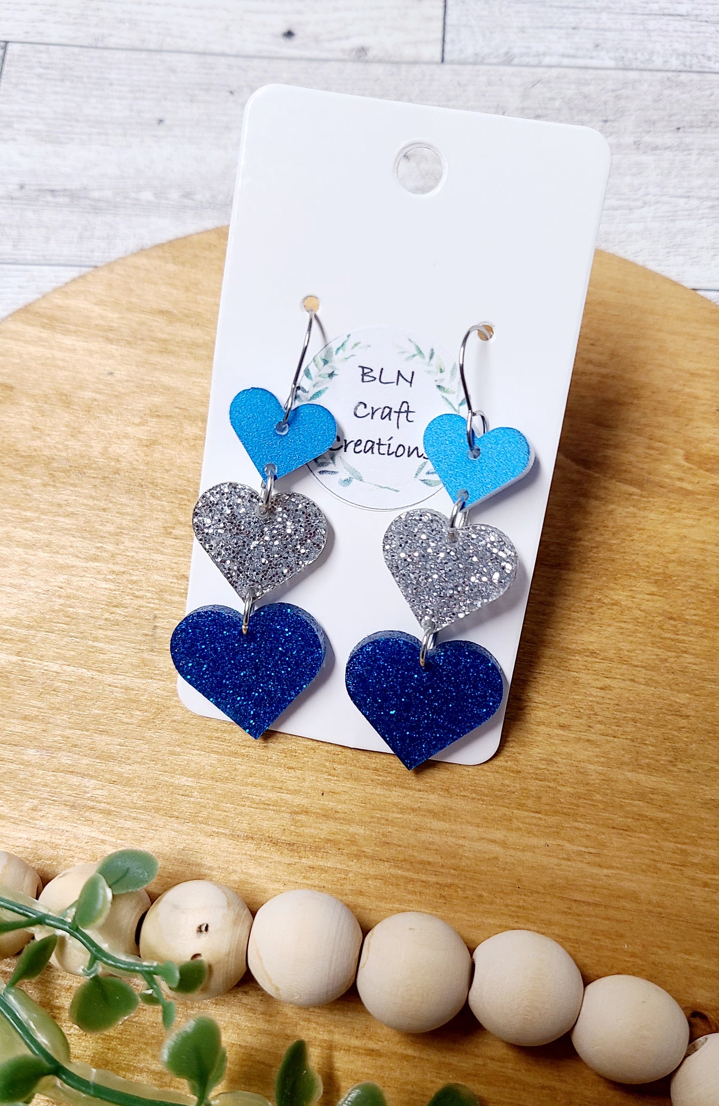 Blue and silver heart earrings