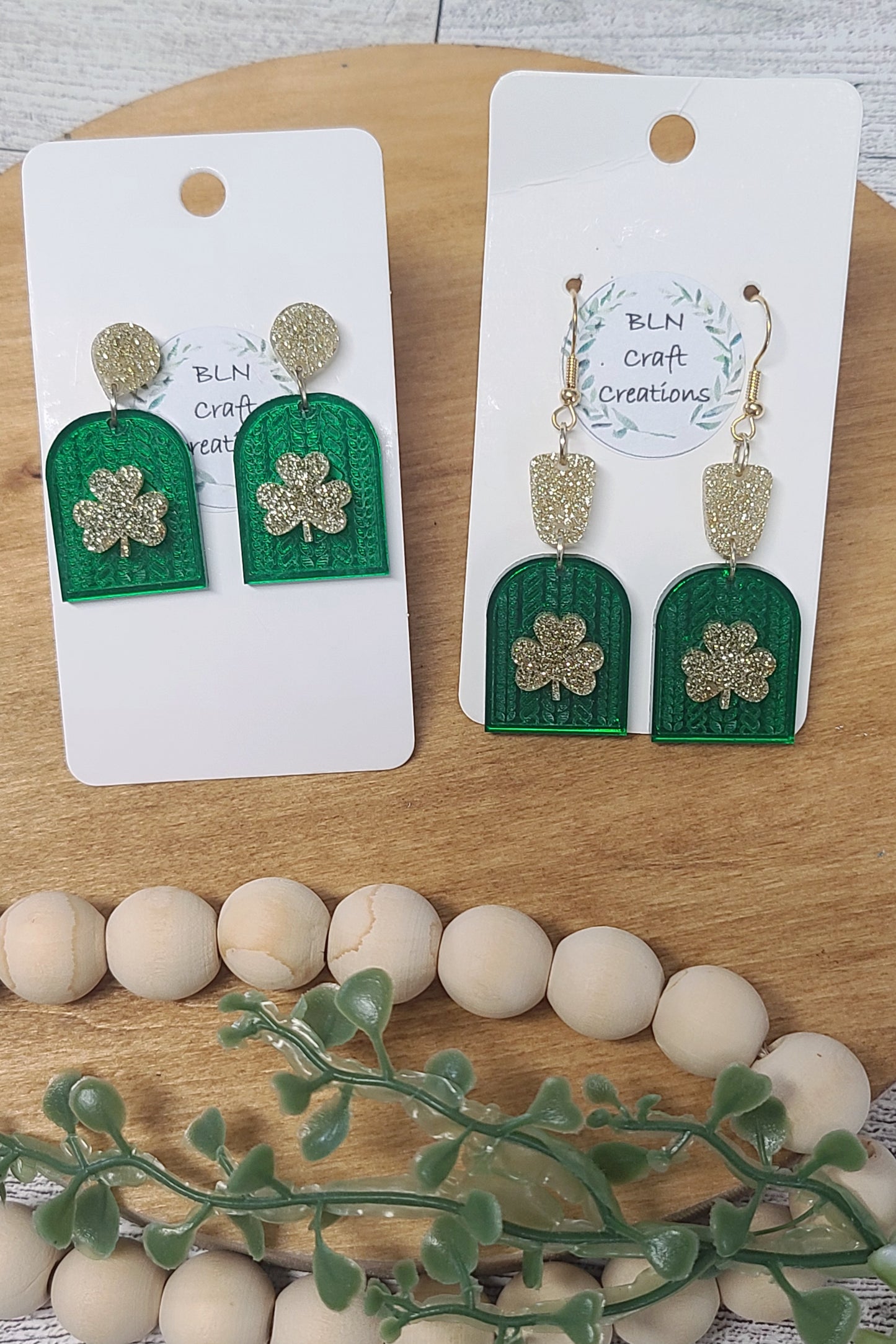 Braided arch clover acrylic earrings