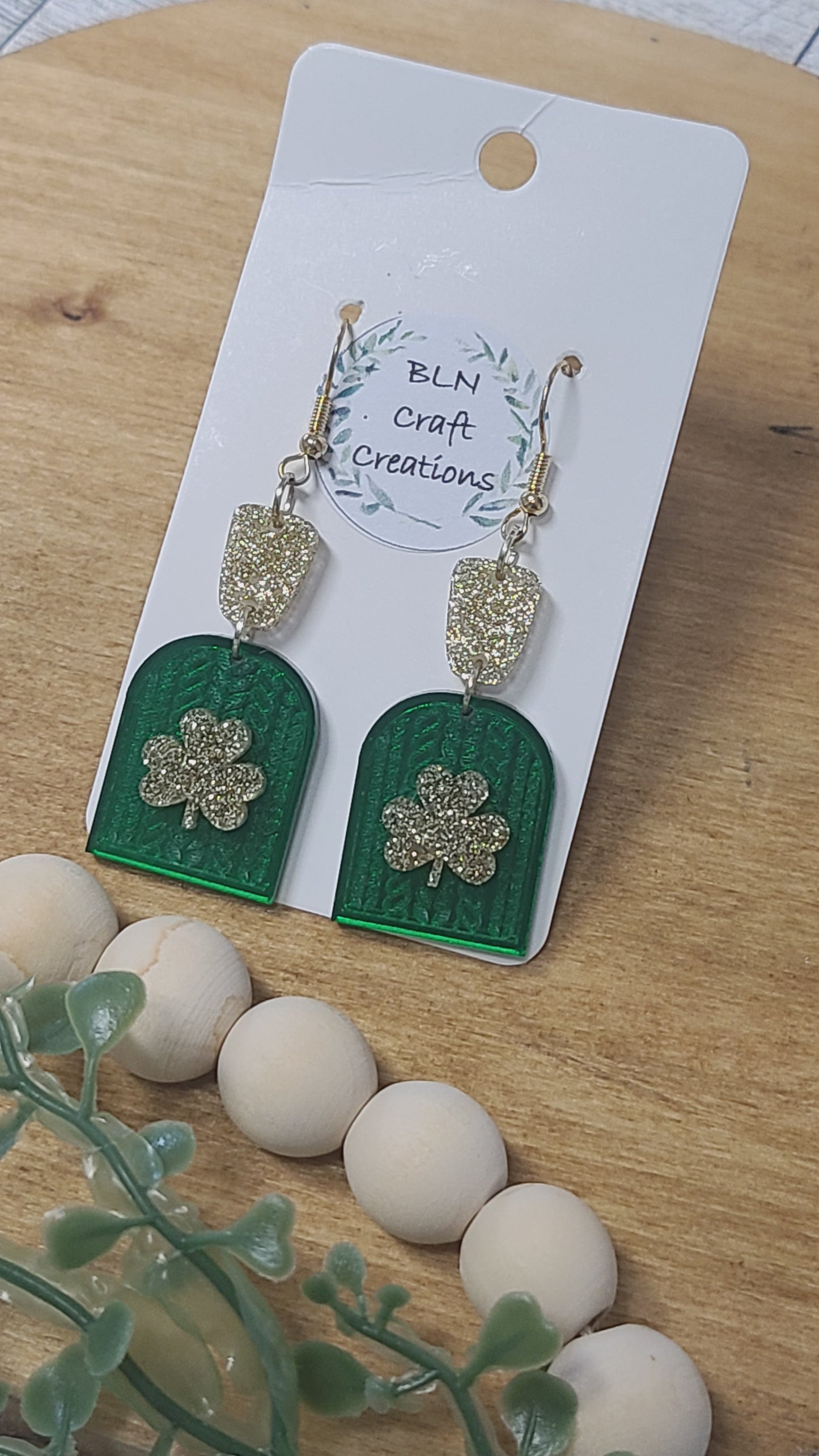 Braided arch clover acrylic earrings