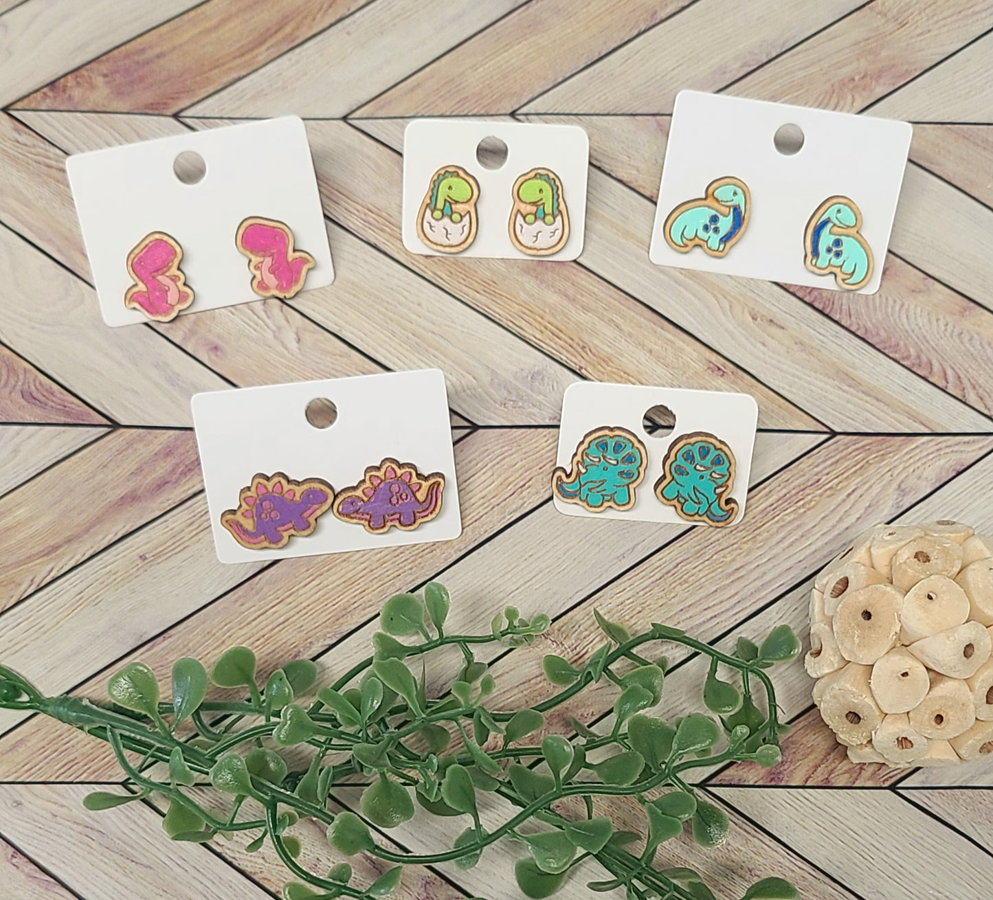 Dinosaur stud earrings