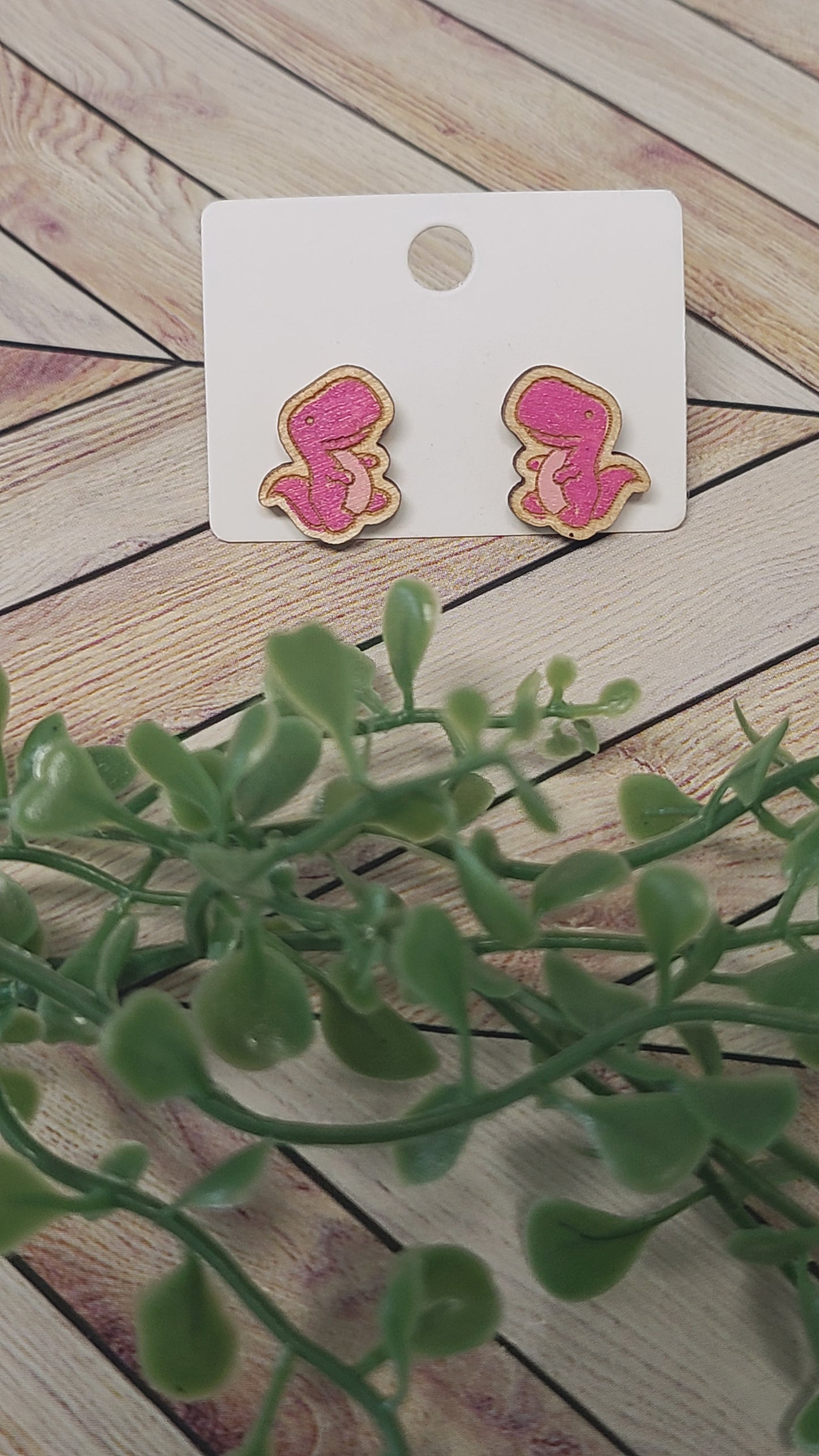 Dinosaur stud earrings