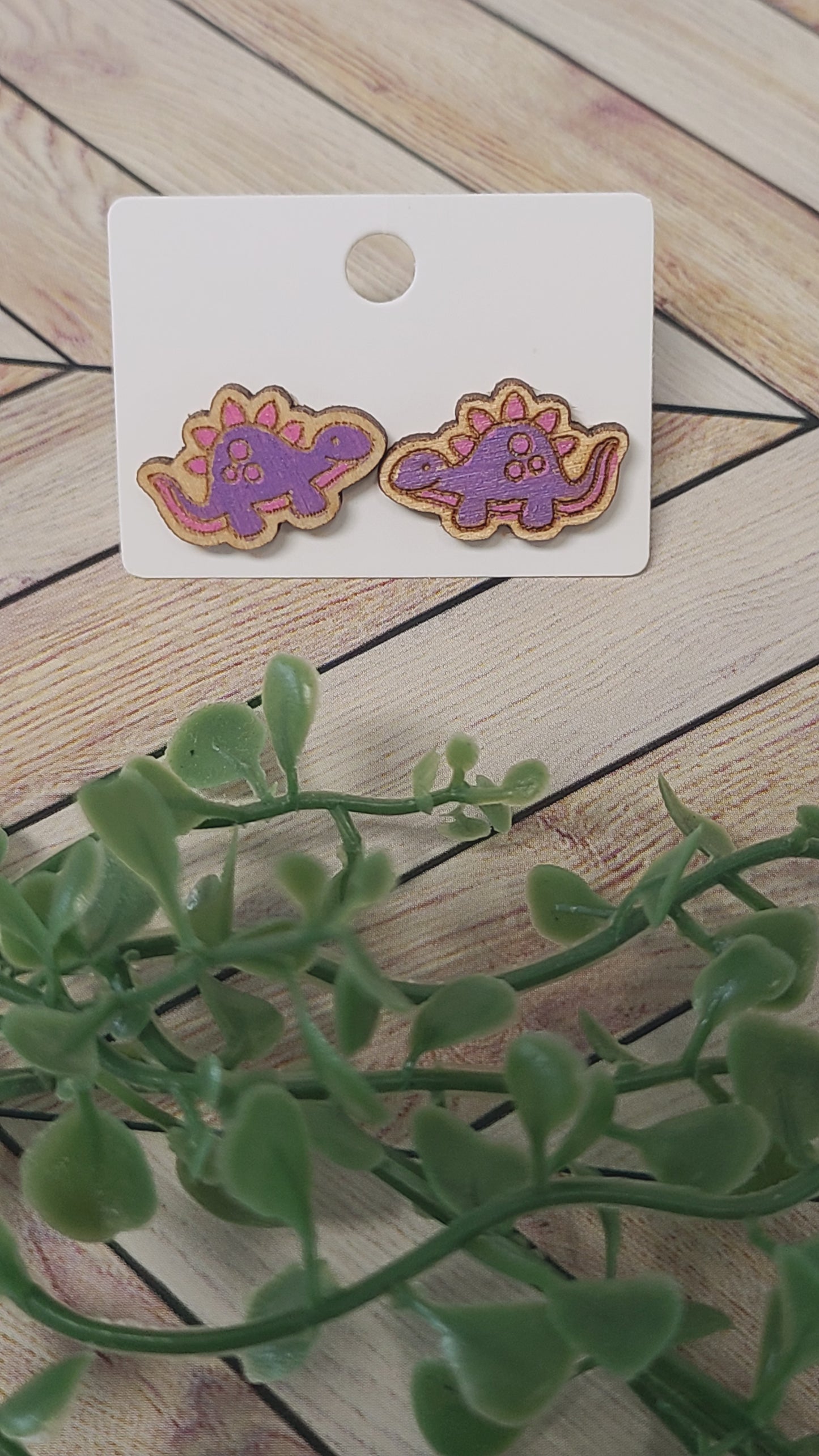 Dinosaur stud earrings