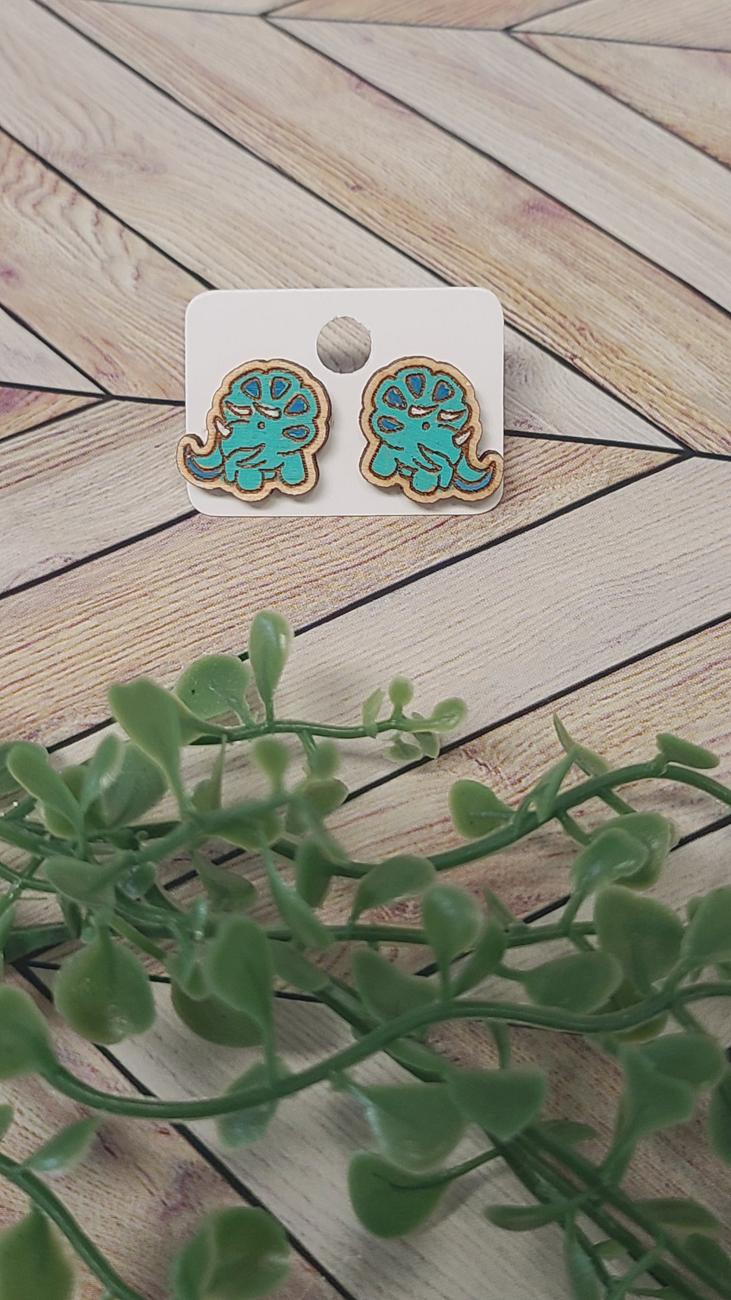 Dinosaur stud earrings