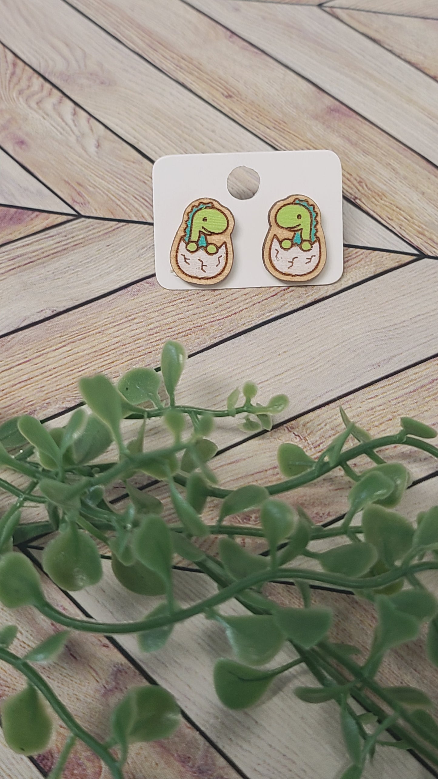 Dinosaur stud earrings