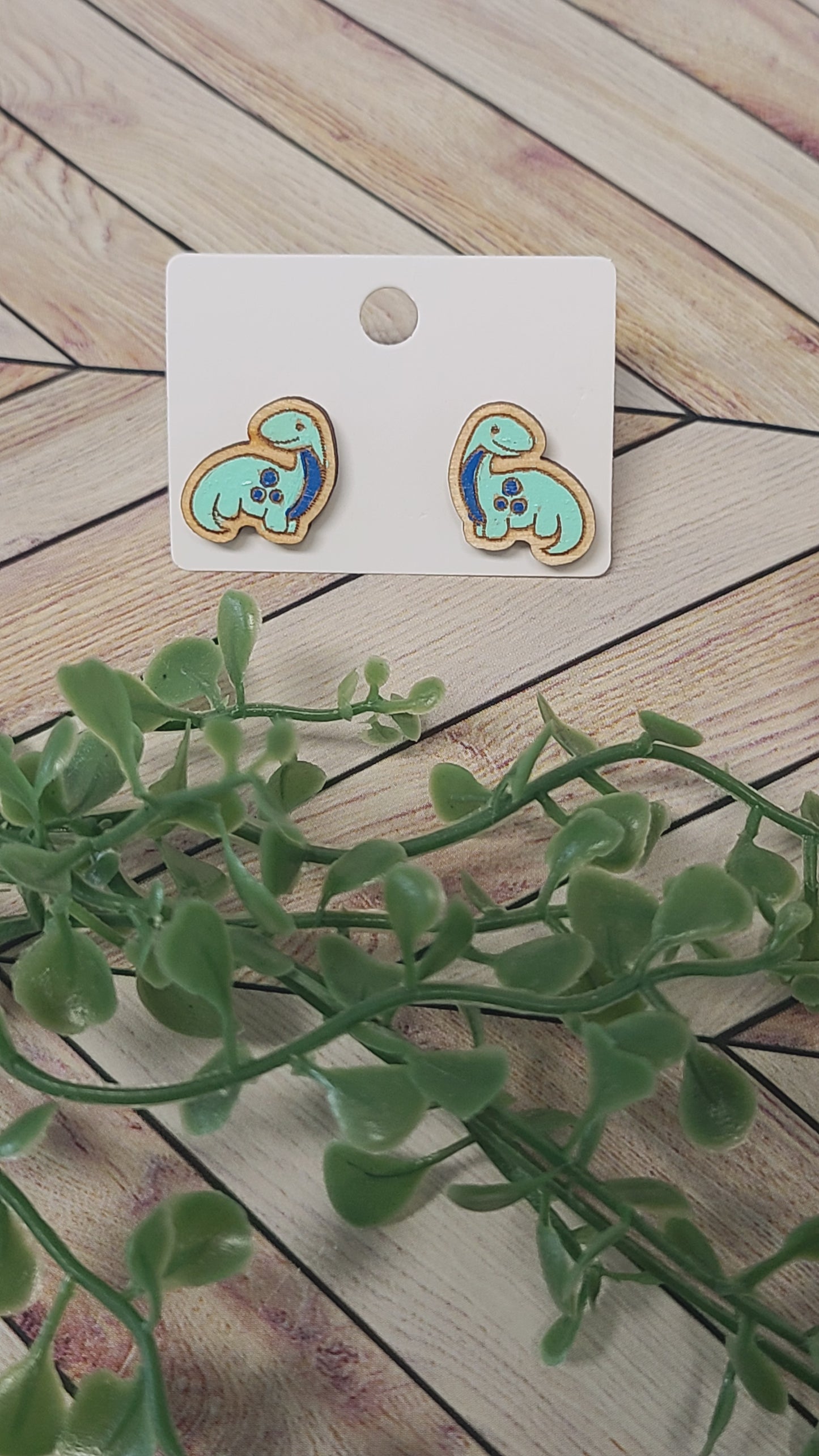 Dinosaur stud earrings