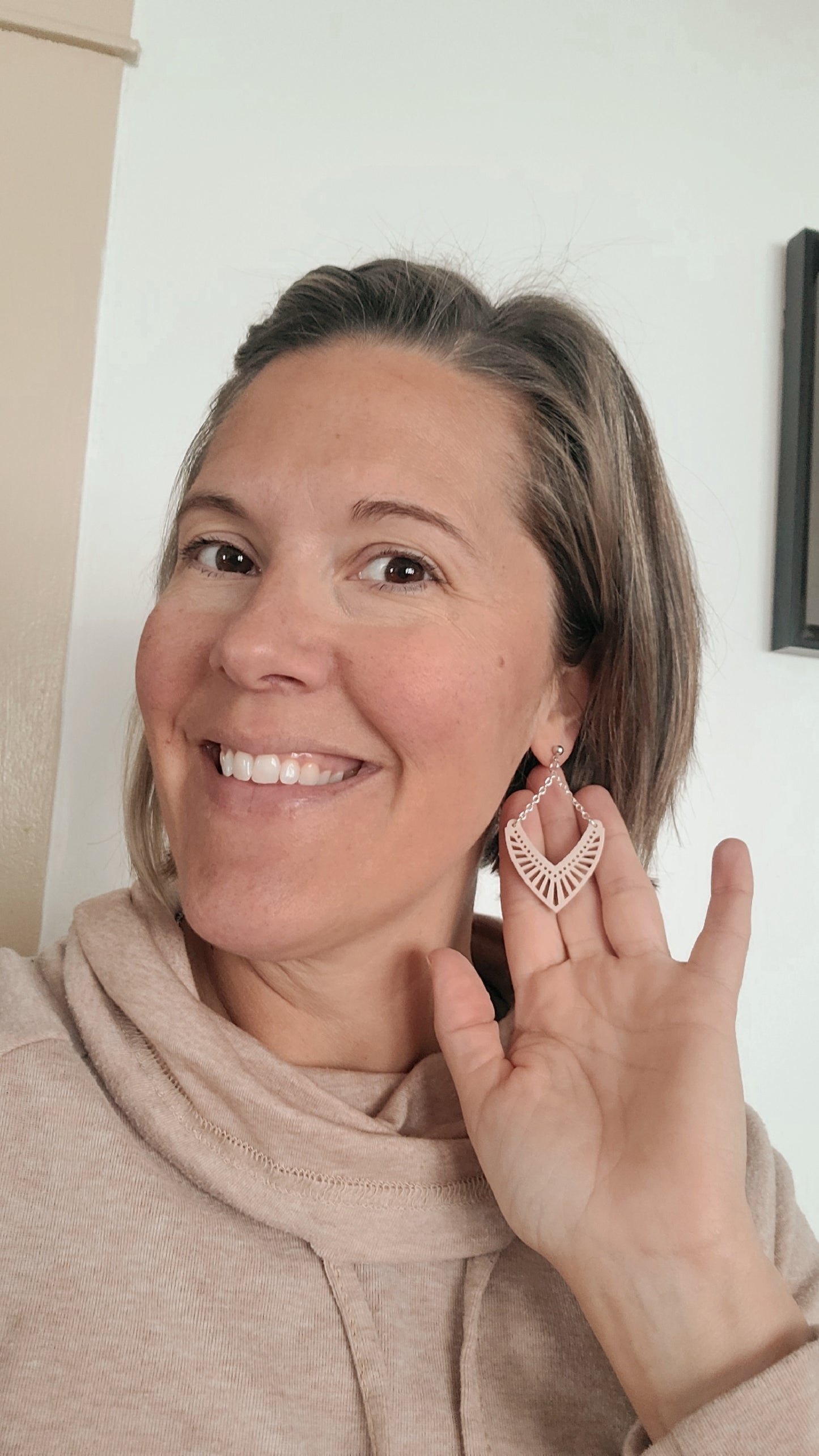 Intricate arrowhead earring