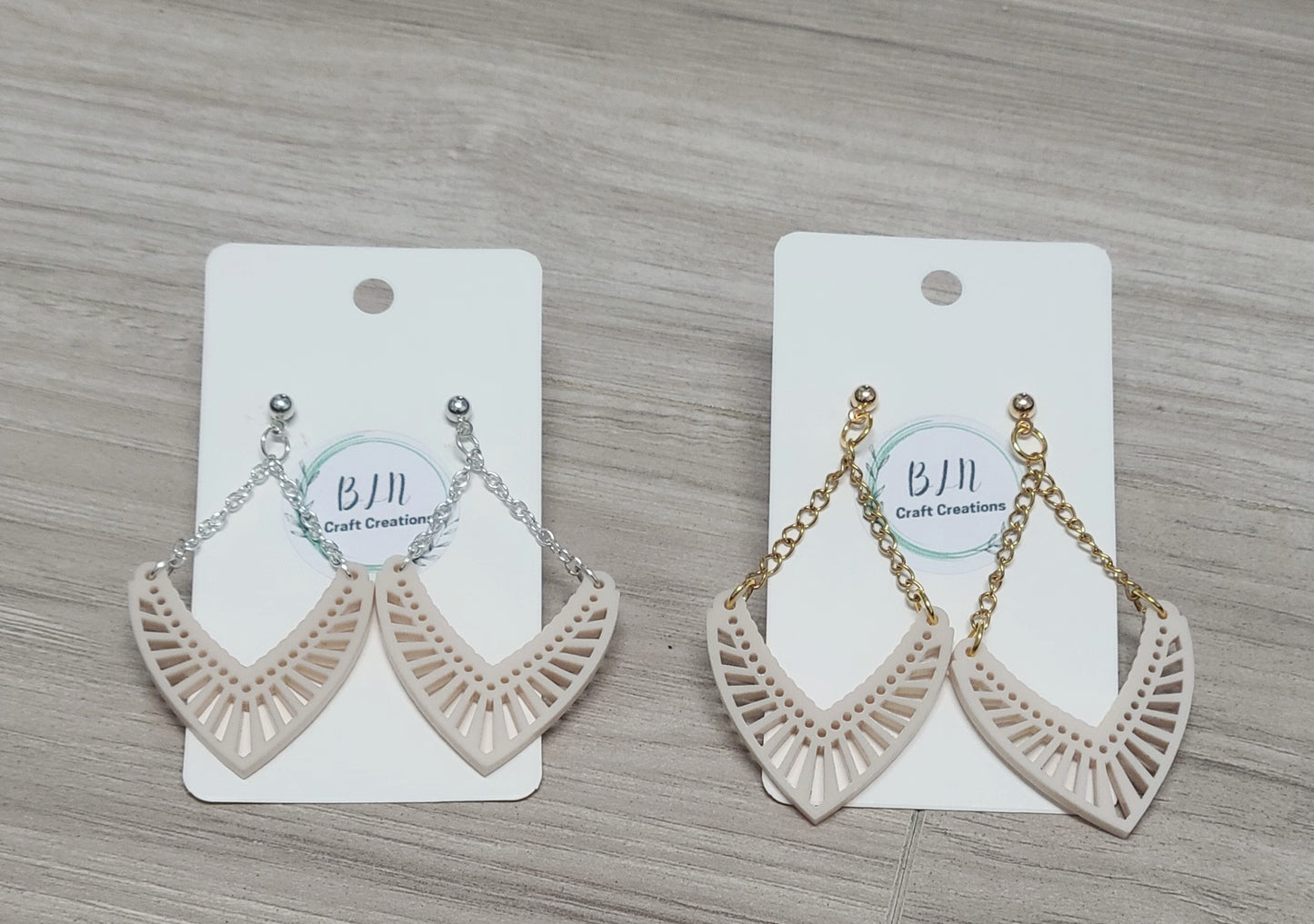 Intricate arrowhead earring